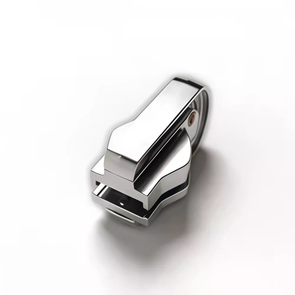 Vändbar skjutreglage för nylondragkedja